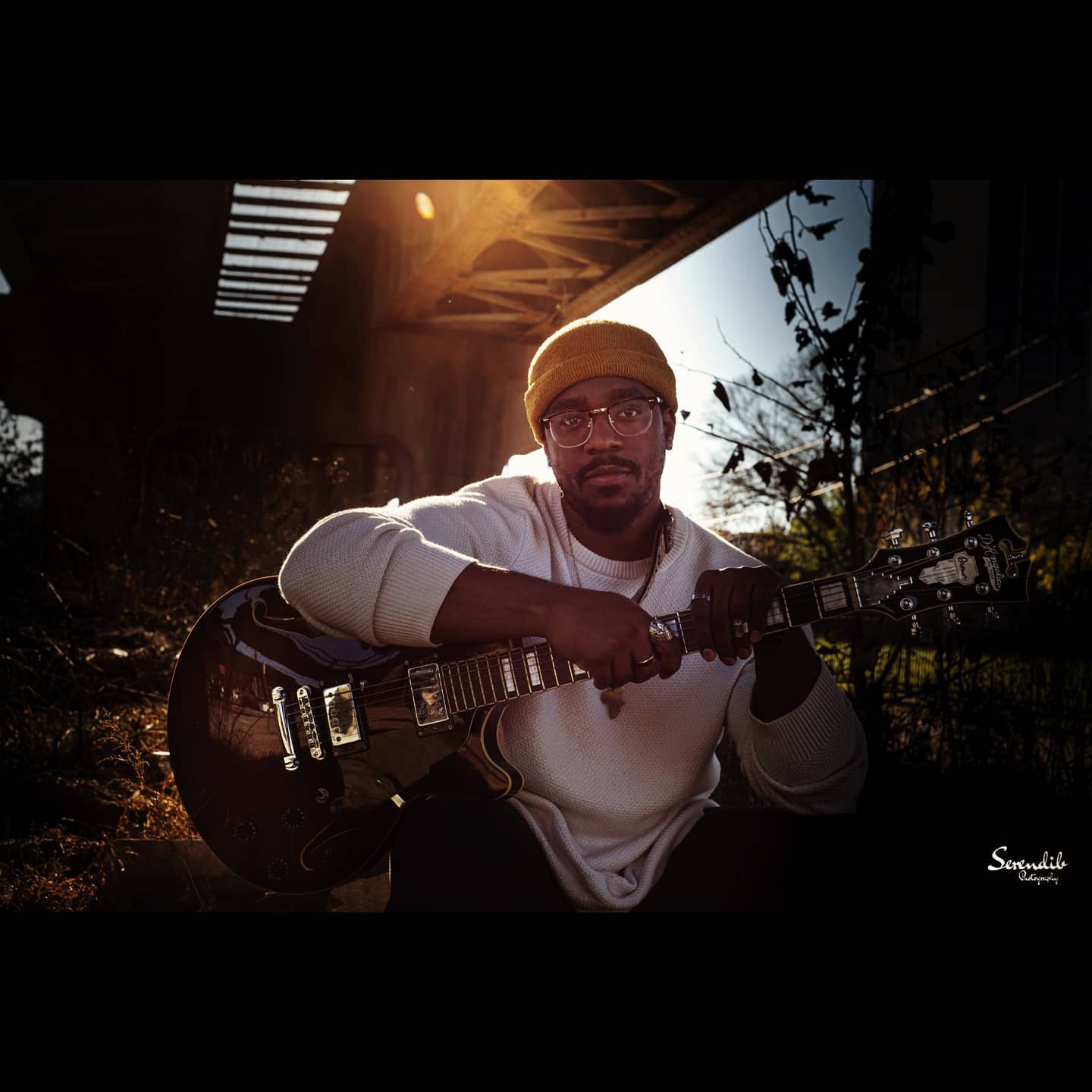 Tre. Charles with Guitar